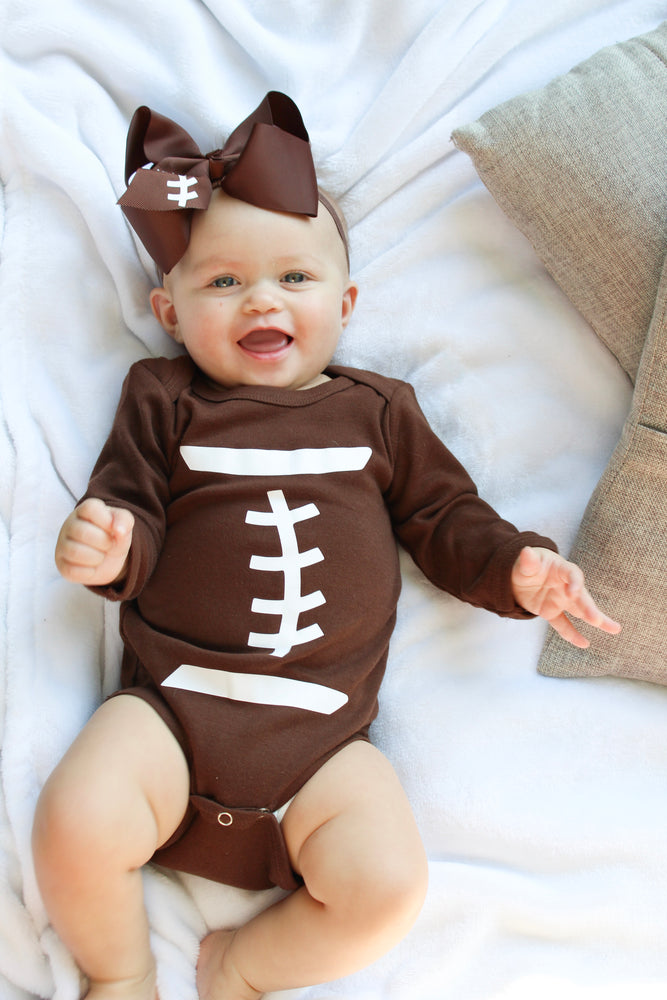 alt="football baby costume"